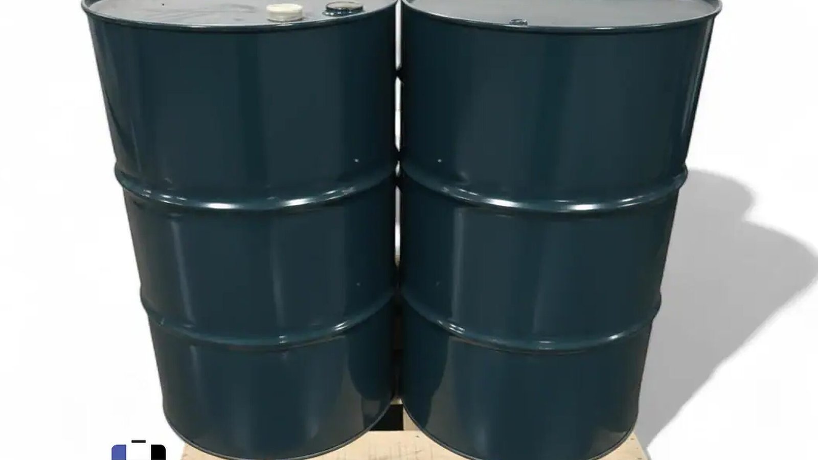 Four steel drums on a wooden pallet