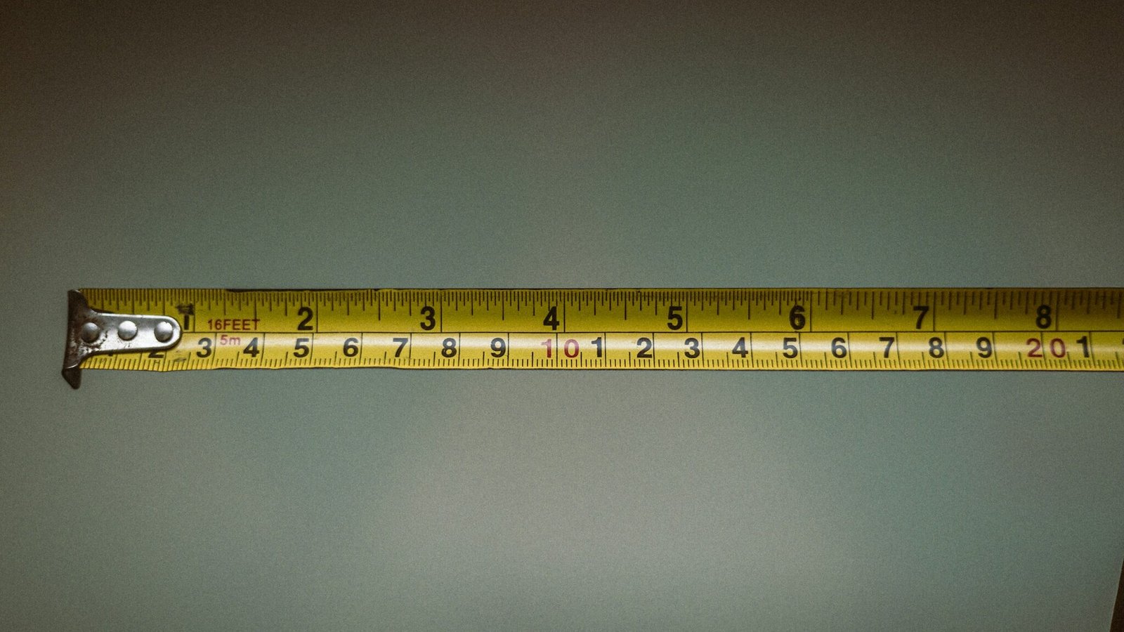 Measuring tape for sizing a water tank space