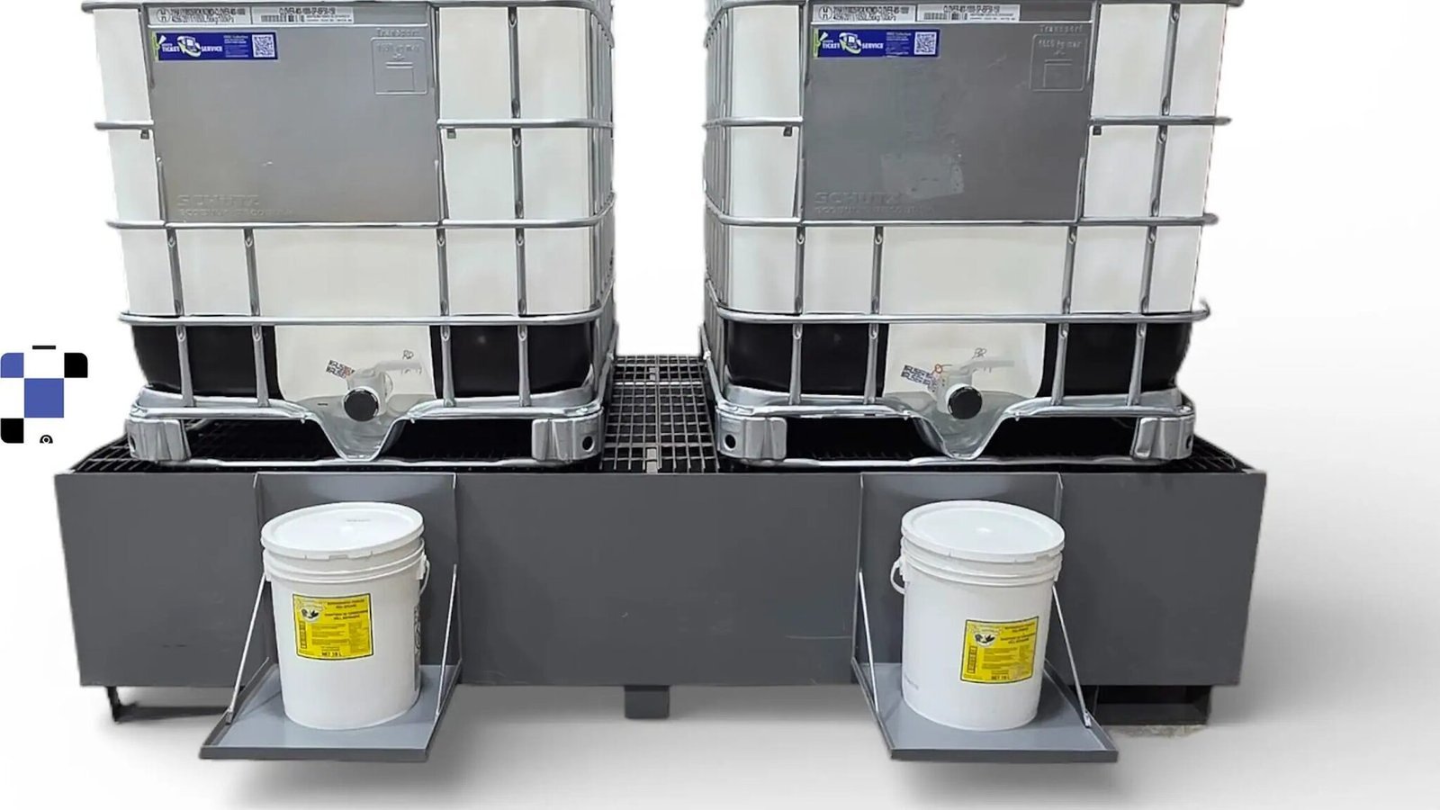 Spill containment skid sump with drip pans under IBC totes
